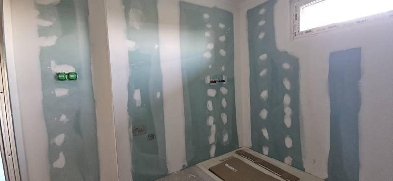 Béton ciré mural et sol salle de bain étanche à Dole